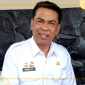 FOTO: Anwar Syahroni Yusuf, Kepala DPMD Kabupaten Sumenep saat berada di ruang kerja. (Red)